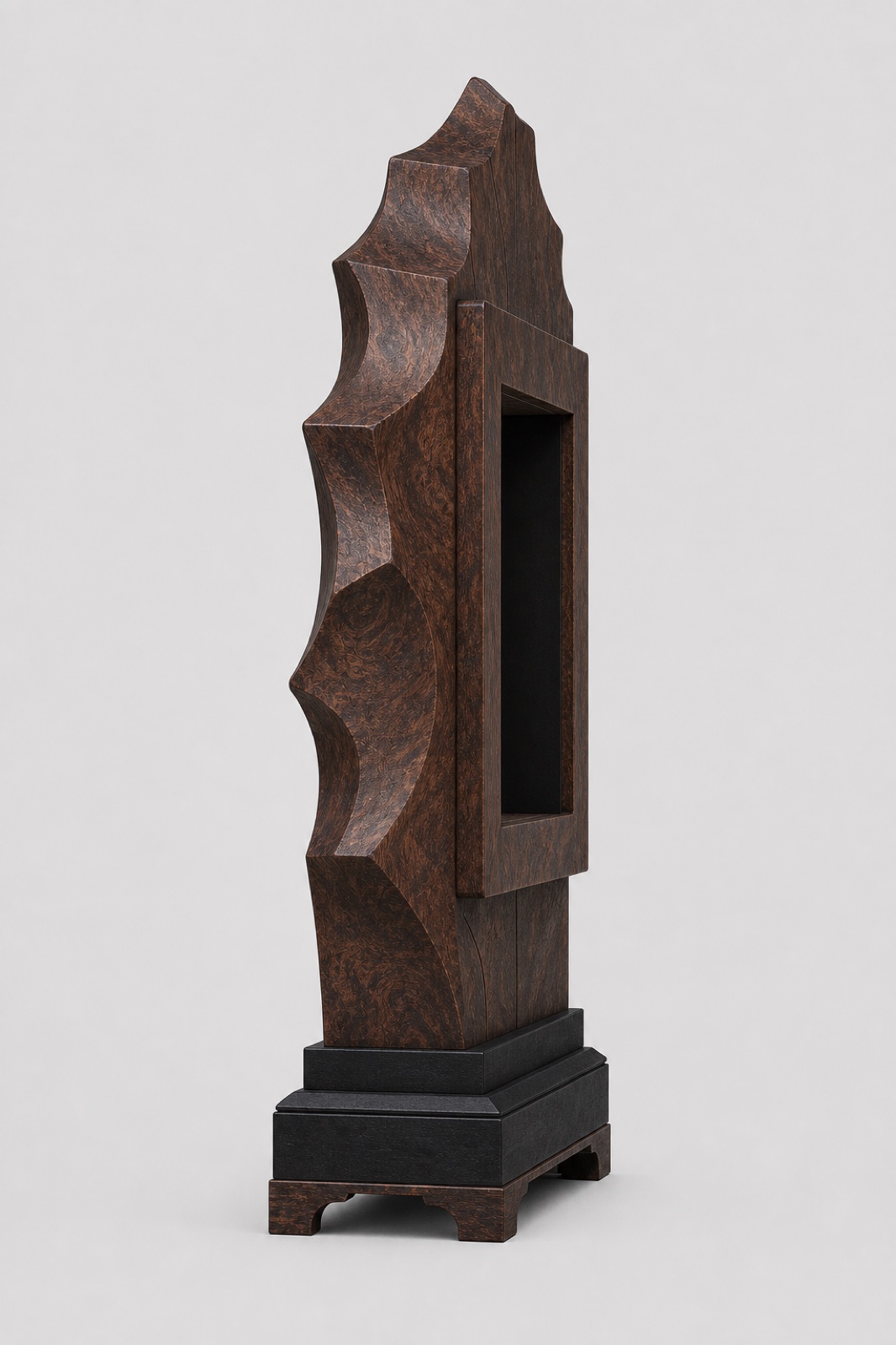 Left side view of the walnut burl cabinet showing the carved edge and display chamber depth.